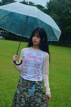 Pink top with ribbon pattern